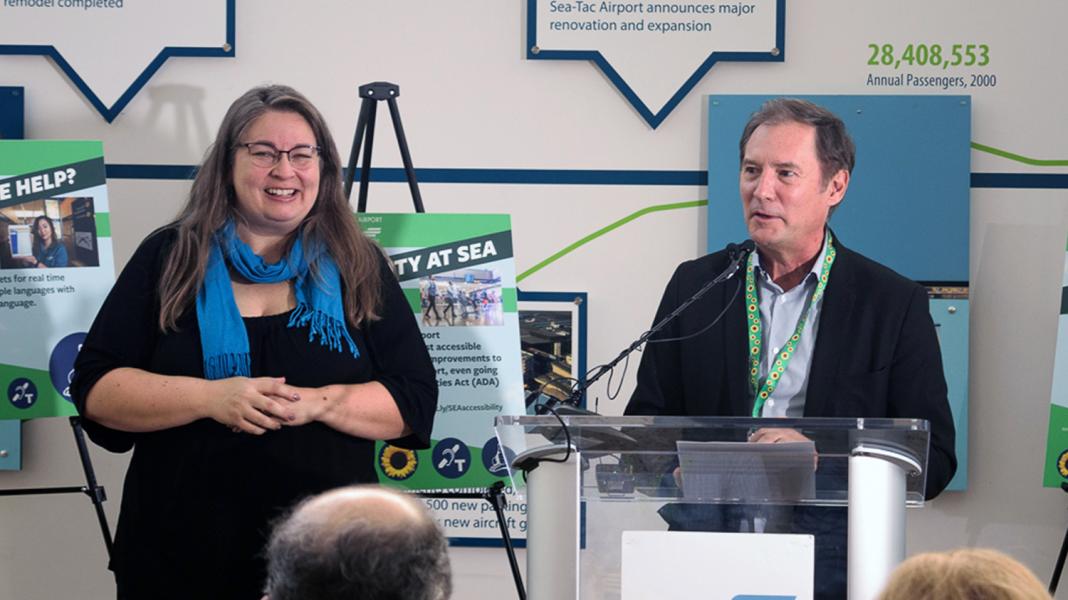 Port of Seattle Commissioner Peter Steinbrueck announces new accessibility services at SEA. Speakers at the press event were accompanied by a sign language interpreter. Photo taken Oct. 23, 2019.
