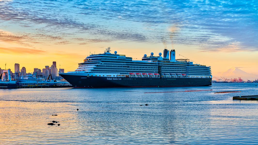 Holland America Eurodam at Terminal 91 with a beautiful orange and yellow sunrise in the background, Seattle, 2016