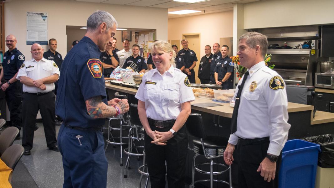 Stephanie McGinnis receives her pin during a Port Fire Department pinning ceremony.