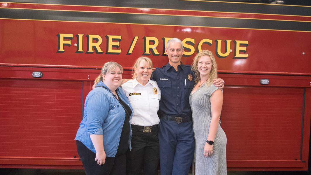 Stephanie McGinnis and her family during a recent pinning ceremony at the Port Fire Department.
