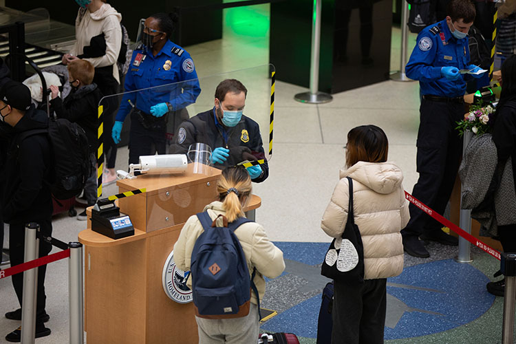 TSA staff working at SEA Airport security checkpoint