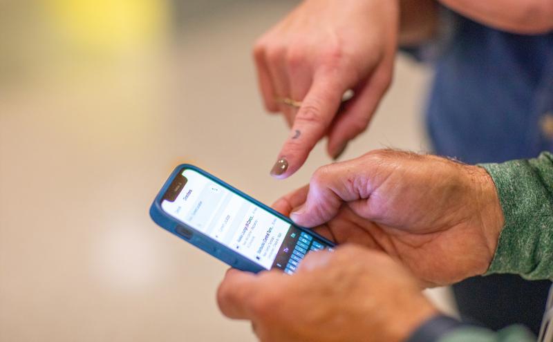 customer gets help on her phone