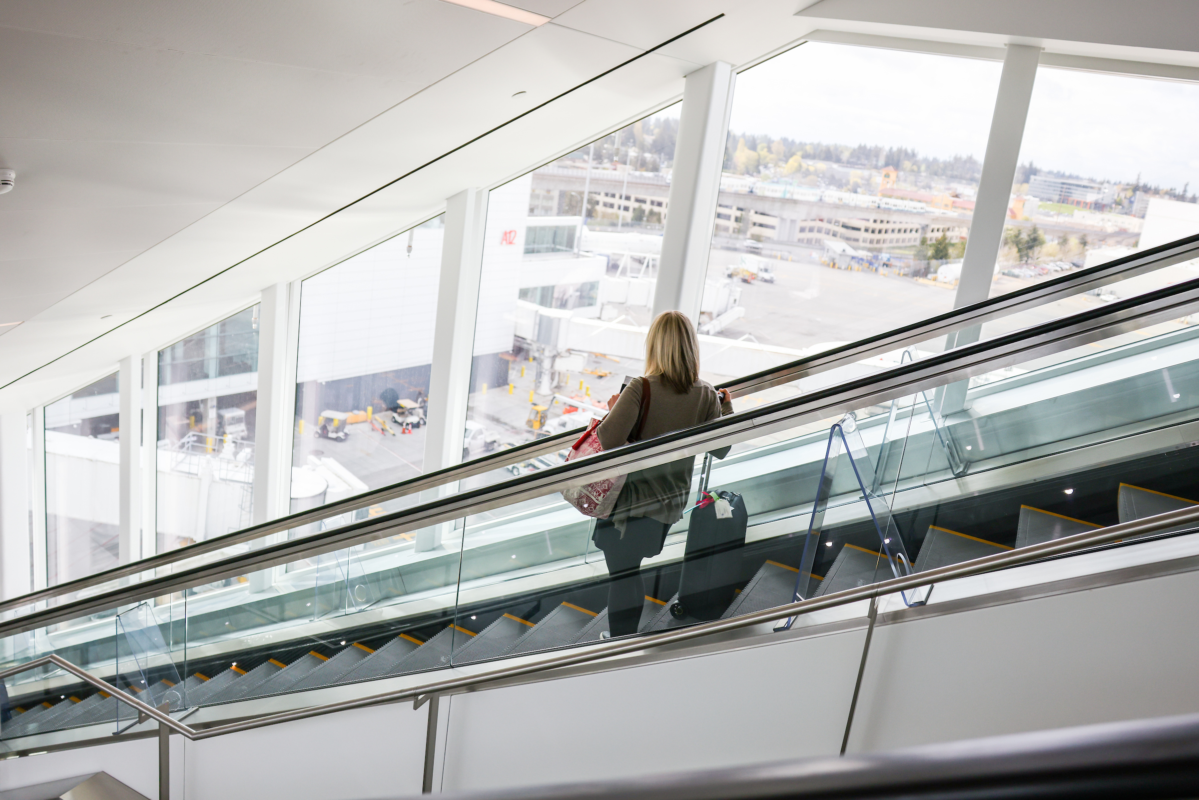 Traveler on escalator