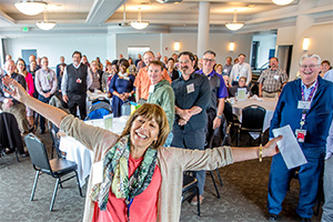 Health and Safety Director Manette Moses poses with her fellow employees at the quarterly Service Award luncheon.