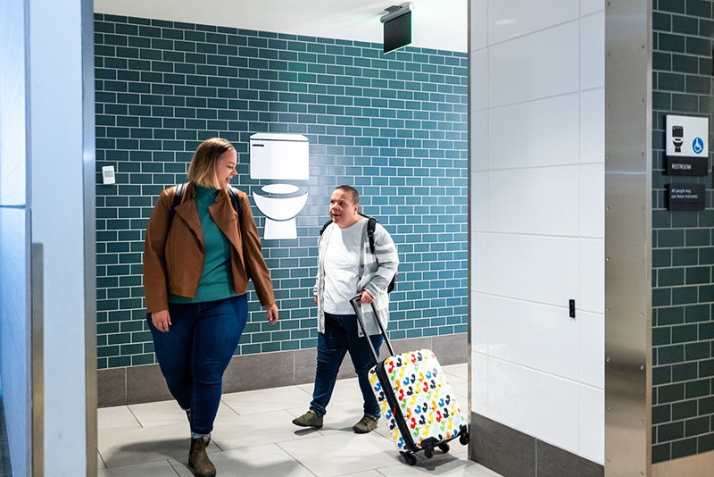 Travelers use accessible restrooms at SEA.