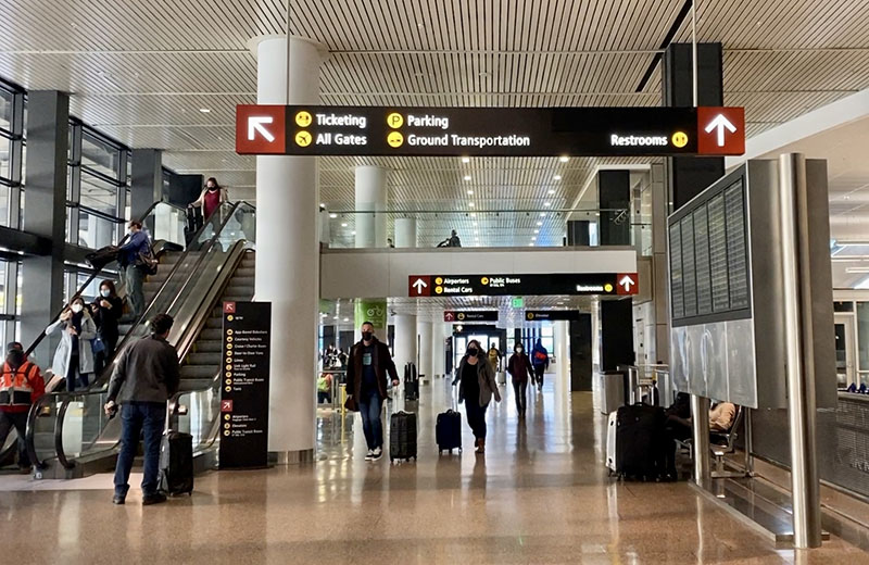 Ground transportation signage inside SEA Airport