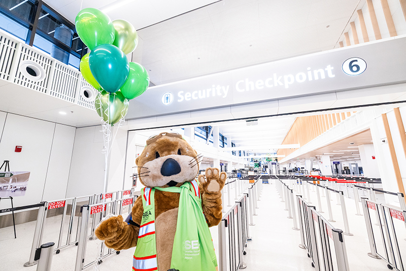 Jett the SEA Otter stands in front of Checkpoint 6