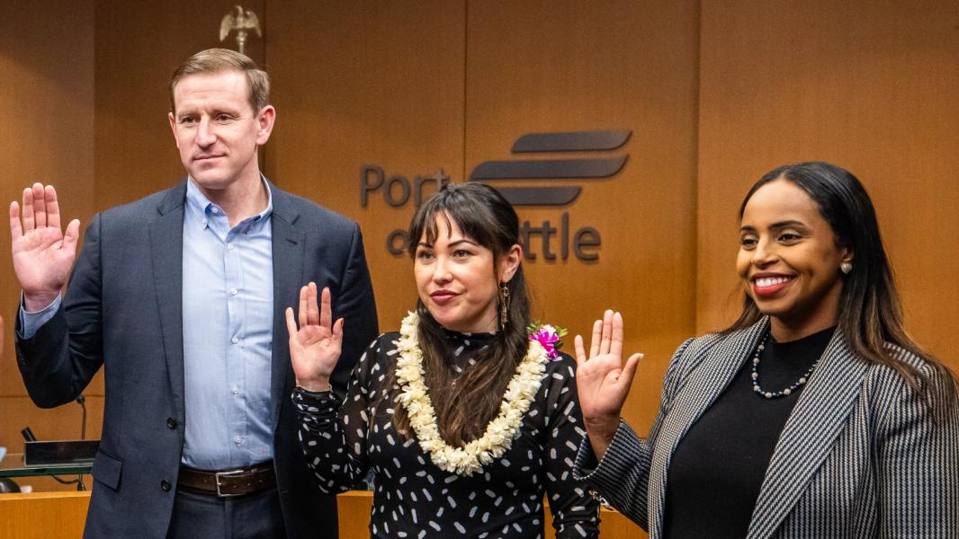 Commissioners Ryan Calkins, Toshiko Hasegawa, and Hamdi Mohamed are sworn in for another four-year term