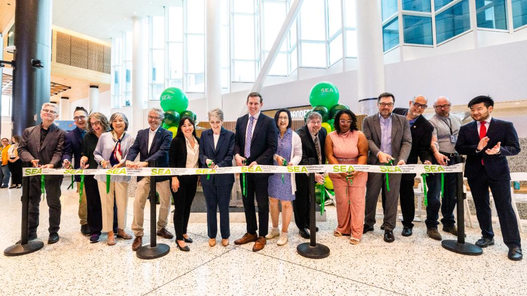Program speakers and select guests officially cut the ribbon for the new CCE building during the Grand Reveal Event. 