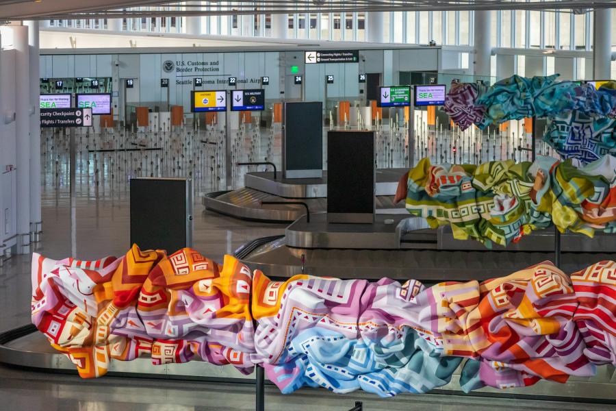 SEA Airport installation of Chalchiutlicue, a five-piece sculpture by artist Marela Zacarías in the International Arrivals Facility