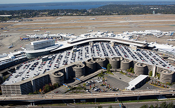 An aerial view of Sea-Tac Airport with the parking garage in the foreground