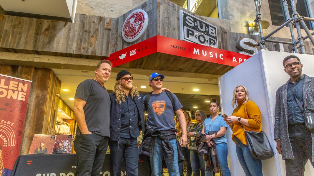 Allen Stone poses with fans at Sub Pop records.