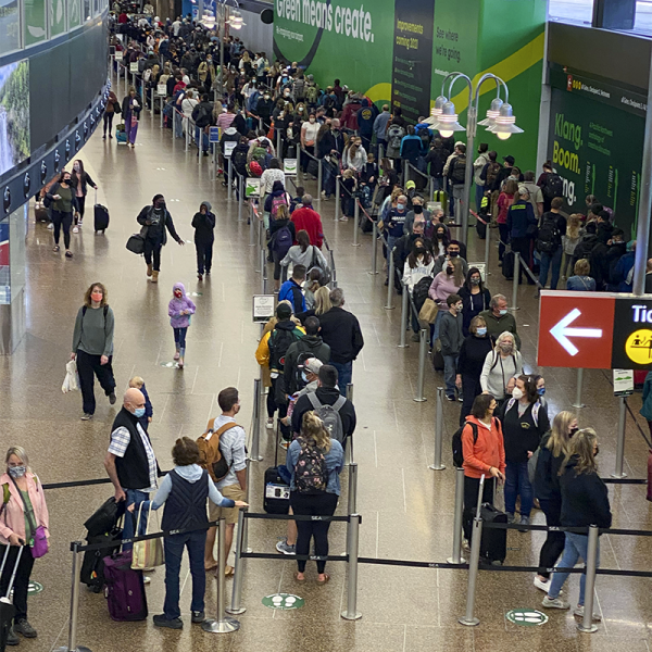 Busy terminal showing long lines. SEA Airport April 2021