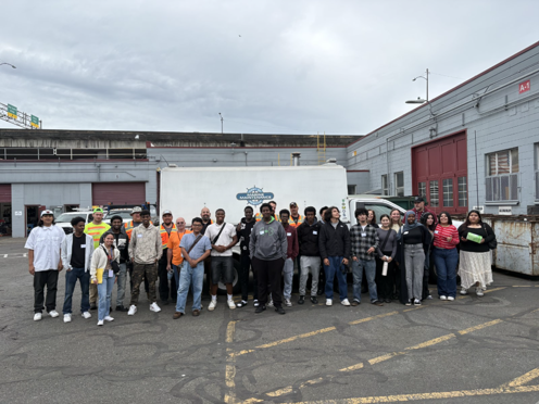 Chief Sealth High School students pose with Port Marine Maintenance staff after learning about skilled trades at the Port.