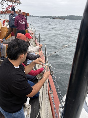 Youth explore the Schooner Adventuress.