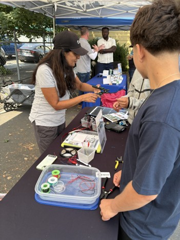 Youth learn about careers at experiential learning fair.