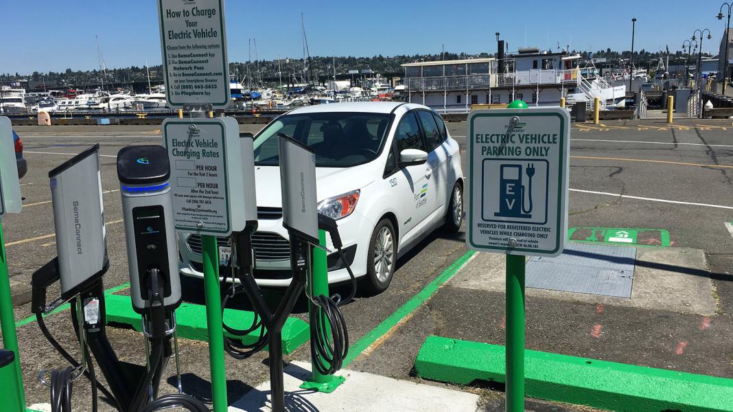 Electric port vehicle and charging station