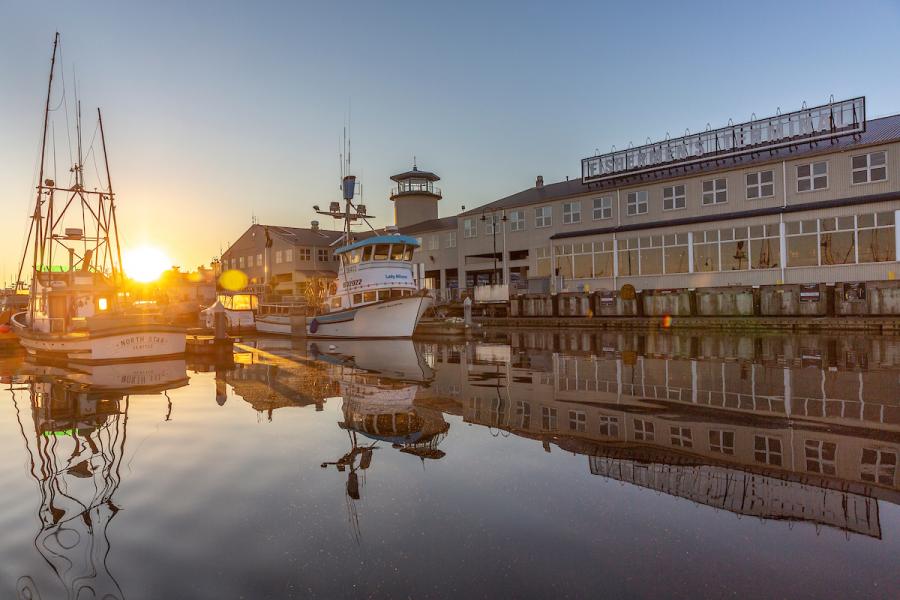 Morning sunshine on Fishermen's Terminal with fishing boats 