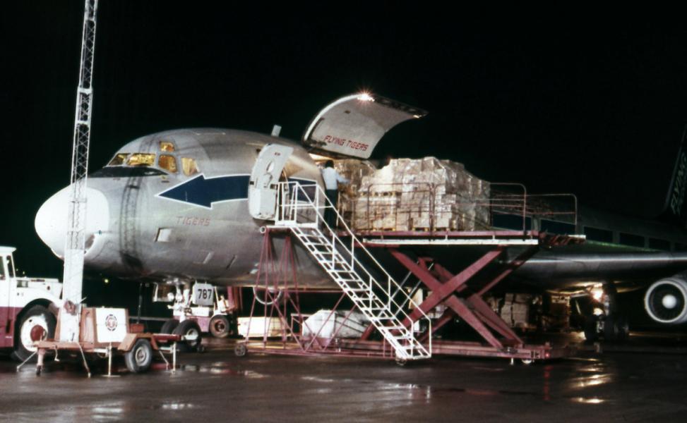 Flying Tiger DC-8 airline being loaded