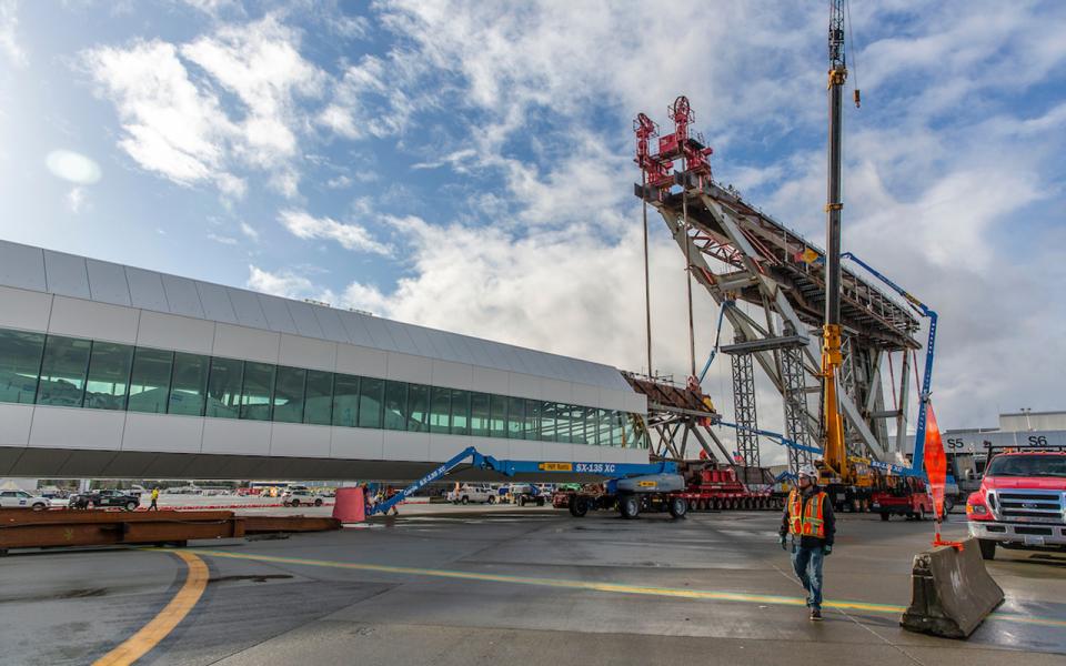 center span lift preparation at the IAF pedestrian walkway