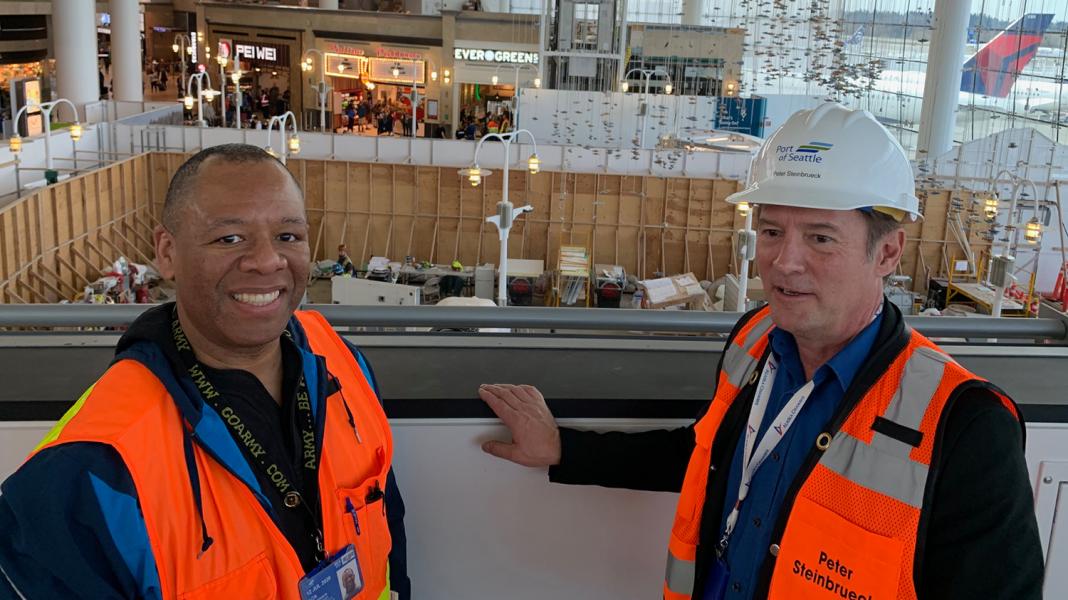 Bradley Benson and Commissioner Steinbrueck overlook the Central Terminal