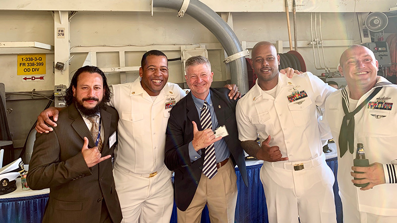 Juan with Navy colleagues