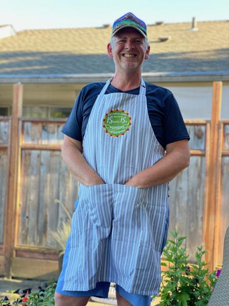 Dylan Randolph poses in a Bonnie B's apron.