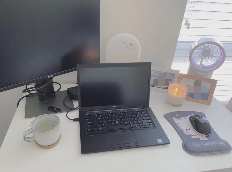 Jenny Wang's desk with her laptop