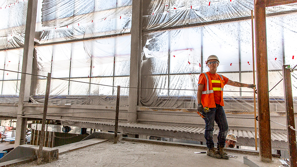 Contractors and workers of a diversity of backgrounds help construct the North Satellite Modernization program at Sea-Tac Airport, Seattle.