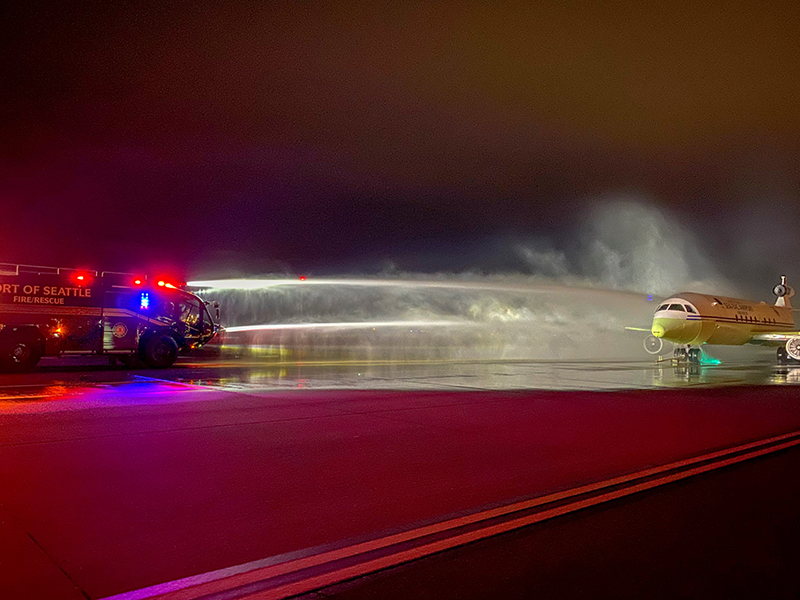 Port of Seattle Fire Truck practicing drills on the airfield at night.