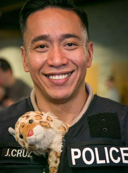 Port of Seattle Police officer and stuffed animal