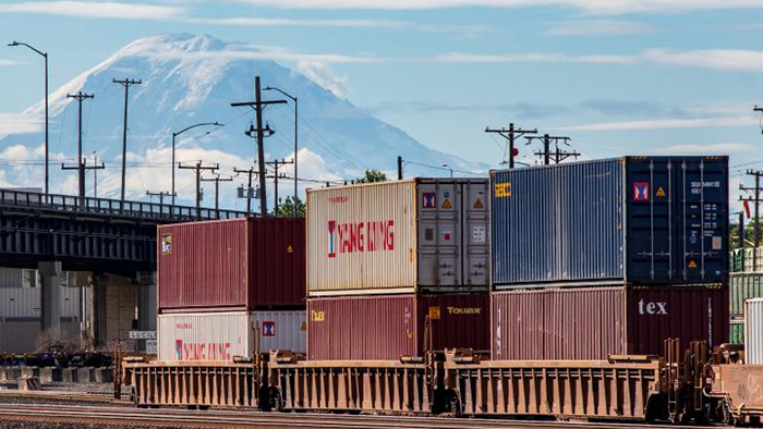  A rail yard with Mt. Rainier in the background.