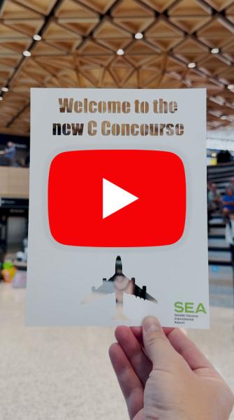 "Welcome to the new C Concourse" paper cut out with the Tree at C and Grand Stairs in the background