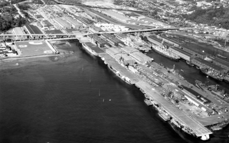 Aerial WWII U.S. Navy warships docked at Pier 91 in Seattle, April 1946.