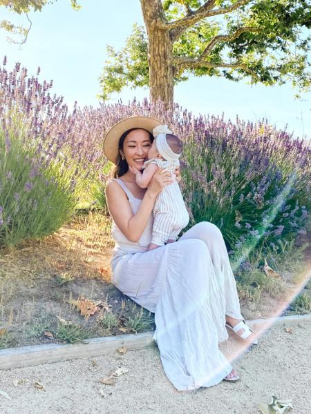 Angela and baby in lavender field.