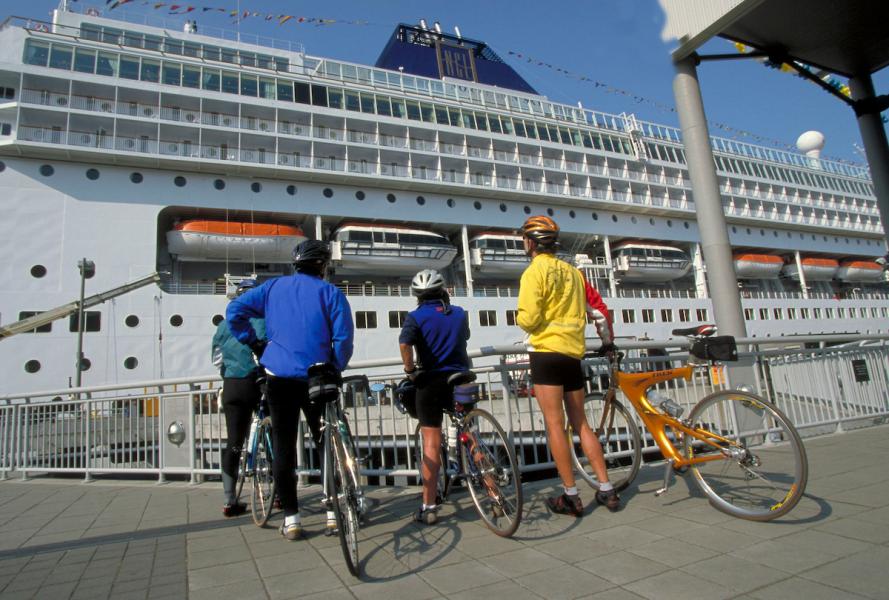 Bikers watch cruise ships dock in Seattle