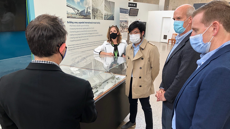 Commissioner Cho and Calkins on a tour of the airport with Government Relations staff.