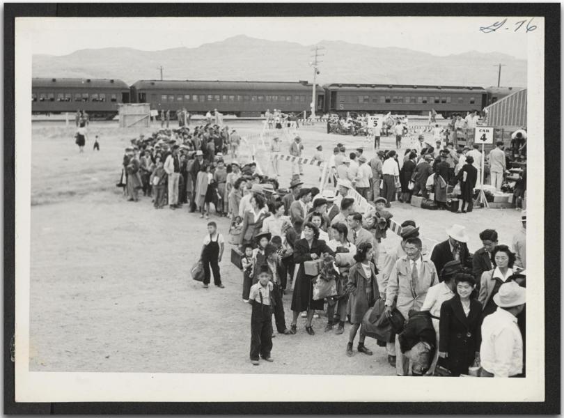 Japenses American Evacuees awaiting induction at an internment camp