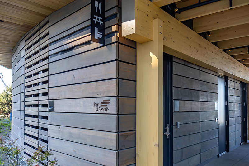 Traditional post-and-beam construction and cedar used in the amenities building.