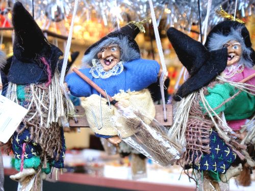 Italian holiday witch ornaments on a tree