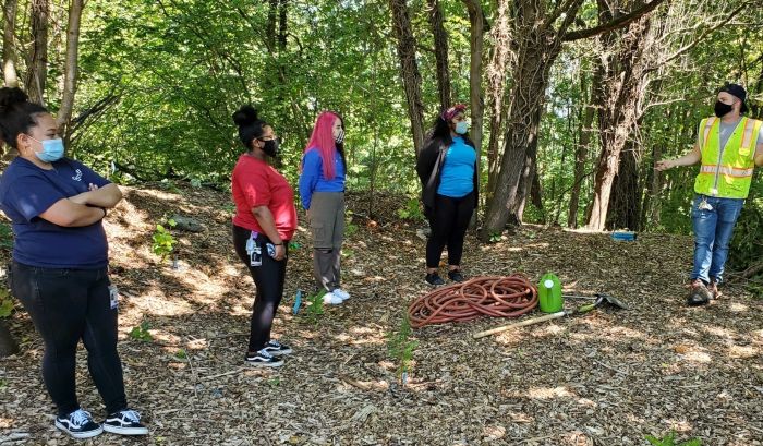 Youth working at a park