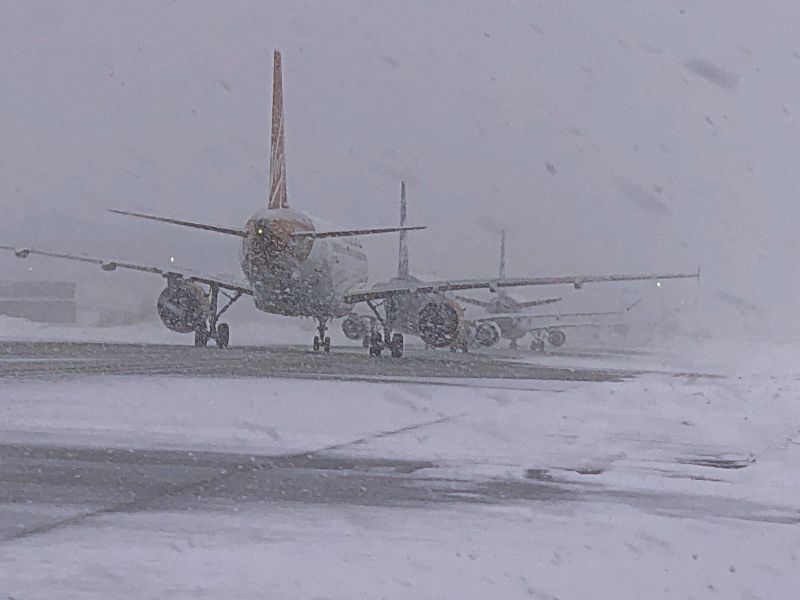Planes operating in a snowstorm