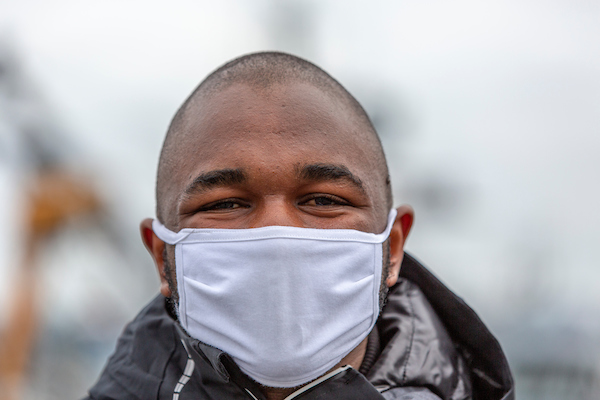 Souleymane Ba wearing a mask at Fishermen's Terminal