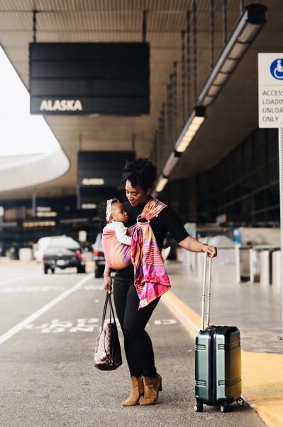 Tash traveling with her daughter