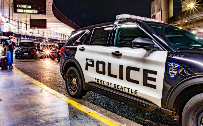 Port of Seattle Police Department vehicle parked on the Departures drive at Seattle-Tacoma International Airport