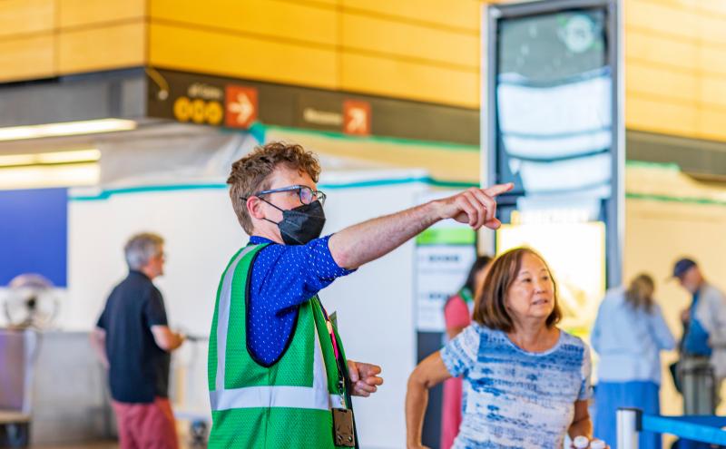 A SEA Ambassador helping a customer 