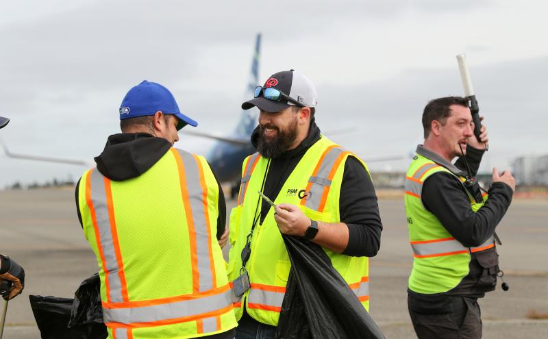 Airport Employees in High Vis Vests