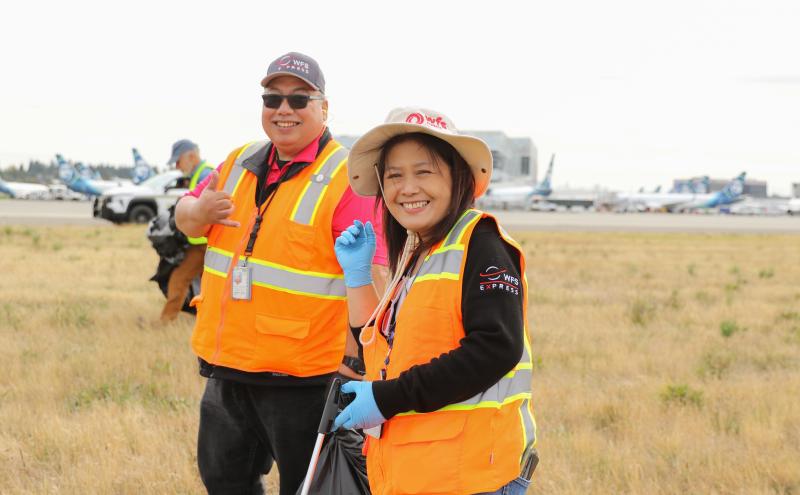 decorative - Two Port employees standing outside