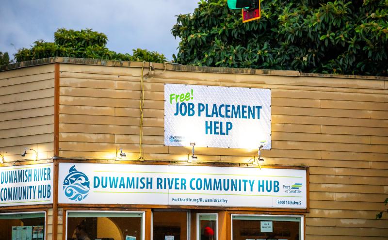 Duwamish River Hub with a sign that says "Free Job Placement Help."
