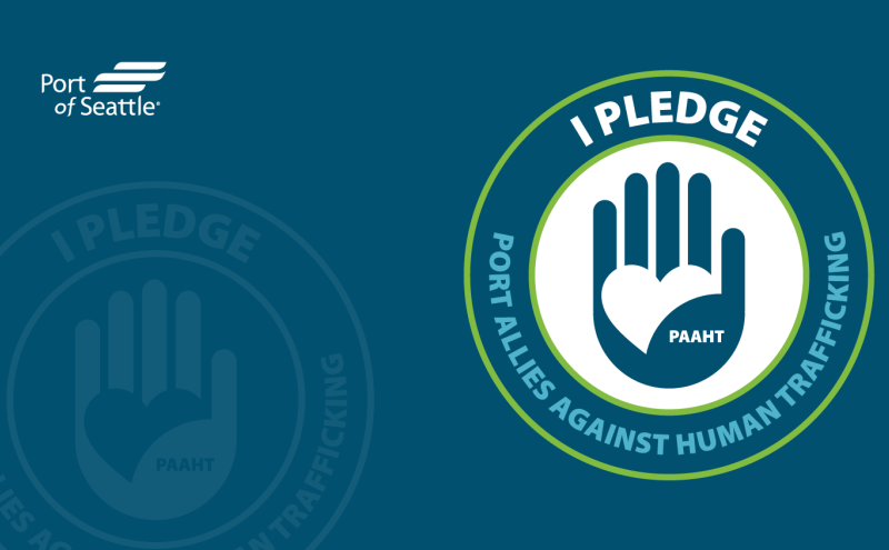  Image of a blue hand that says "I Pledge" and "Port Allies Against Human Trafficking"
